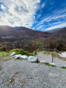 a group of rocks on top of a hill at Chalet Douce Noire in Brides-les-Bains