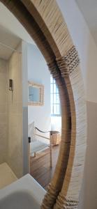 a view of a hallway from a room at LE CLOS ZÉLIE in Pouilly-le-Monial +48 photos