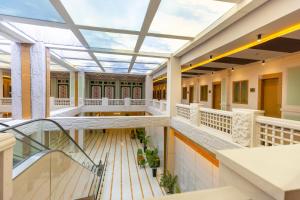 an image of a building with a glass ceiling at National Hotel Ganja in Ganja