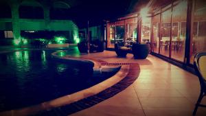 Der Swimmingpool an oder in der Nähe von Riviera Taouyah Hotel