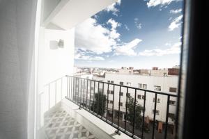 a balcony with a view of a city at Résidences Nador in Nador