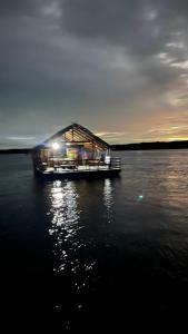 a boat in the middle of a body of water at Krabi Floating Glamping in Ban Khlong Khae (2)