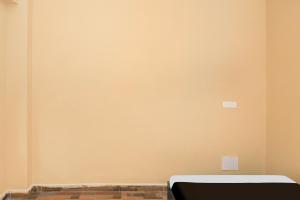 a room with a wall with a mattress on it at Hotel O by OYO Rajveer Hotel in Rāmgarh