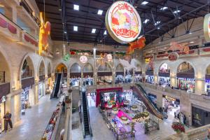 an overhead view of a shopping mall with stores at National Hotel Ganja in Ganja