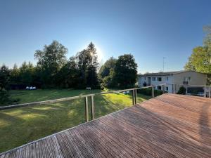 a large deck with a view of a yard at R-Joki Apartments in Ravijoki