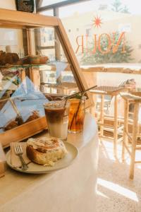 a plate of food sitting on a counter with a pastry at NOUR Tamraght in Tamraght Ouzdar