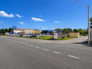 an empty street with cars parked on the side of the road at Gerosa Guest House in Lamezia Terme