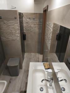 a bathroom with a sink and a shower at Casa Ramalma Estate in Brianza Appartamento tra Milano Monza e Como con self check-in in Seveso +47 photos