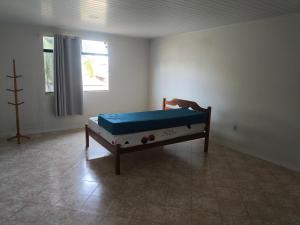 a bedroom with a bed in a room at Paraíso do Abais, house for rent in Estância