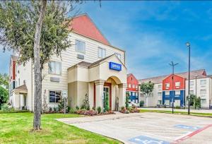 a rendering of a hotel with a building at Everstay Living in Dallas