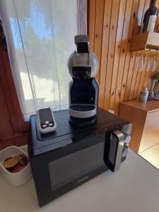 a coffee maker sitting on top of a counter at Eva House 2 in Fanano