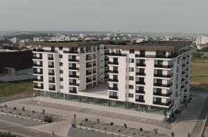 an aerial view of a large white apartment building at Twin Constantin-Apartment in Suceava