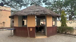 a small hut with a man sitting at a desk at SimHan Luxury Hotel & Resort Jengre in Jengre