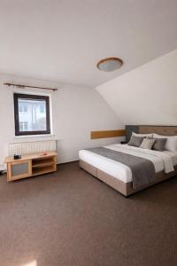 a bedroom with a large bed and a window at Villa Grande Praha in Prague +38 photos