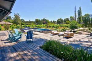 a patio with chairs and a swimming pool at Haven With Pool, Hot Tub And Tastings Included in Healdsburg +59 photos