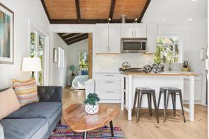 a kitchen and living room with a couch and a table at Bennett Valley Eden in Santa Rosa +42 photos
