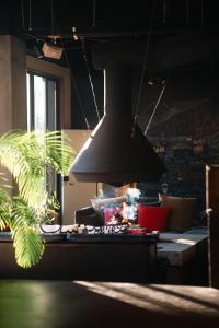 a blackendant light hanging over a table in a kitchen at RoheN ASHINOKO in Hakone