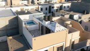 an aerial view of a city with white buildings at Villa America Dakhla in Dakhla