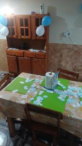 a table with a table cloth with a candle on it at Casa Del Pino in La Banda +15 photos