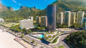 an aerial view of a city with mountains and buildings at Hotel Nacional in Rio de Janeiro