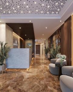 a lobby of a hotel with a reception desk at Splendid Star Suite Hotel in Hanoi