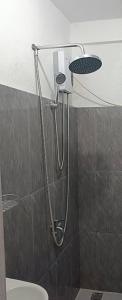 a shower in a bathroom with a toilet at CHIEF'S VILLA Rentals Malapascua Island in Malapascua Island +107 photos