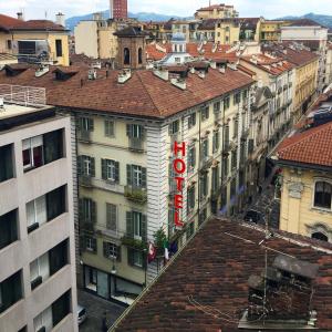 an overhead view of a city with buildings at Le Petit Hotel in Turin