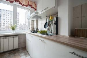 Kuchyňa alebo kuchynka v ubytovaní Center Warsaw - Apartament Jana Pawła
