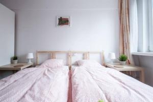 Posteľ alebo postele v izbe v ubytovaní Center Warsaw - Apartament Jana Pawła