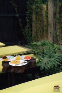 a table with two plates of food on it at Trang An Ninh Binh Rustic Hideaway in Ninh Binh +95 photos