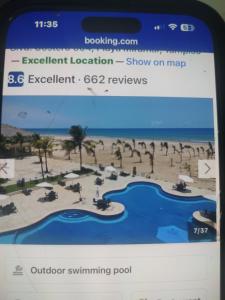 a screenshot of a website showing a rendering of a resort at Arenas del mar in Monterrey