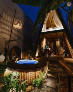 a room with a hot tub in a house at mango house, hide out Can Tho in Ấp Bình Thương