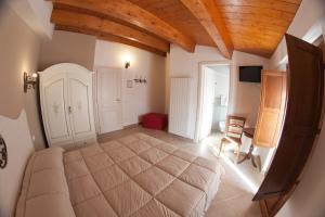 Llit o llits en una habitació de Il Vicoletto B&B