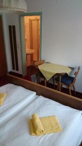 Postel nebo postele na pokoji v ubytování Pension Sonnengrund