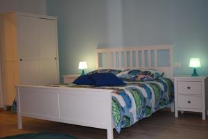 Łóżko lub łóżka w pokoju w obiekcie La casa di Kro
