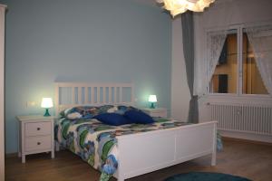Łóżko lub łóżka w pokoju w obiekcie La casa di Kro