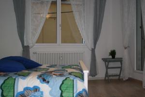 Łóżko lub łóżka w pokoju w obiekcie La casa di Kro