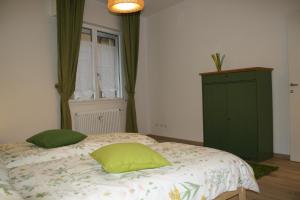 Łóżko lub łóżka w pokoju w obiekcie La casa di Kro