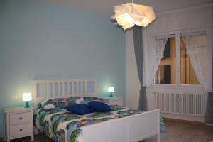 Łóżko lub łóżka w pokoju w obiekcie La casa di Kro