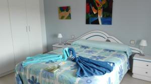 A bed or beds in a room at Casa Rural González Montsec Montrebei