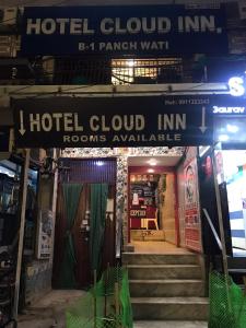 a hotel building with a sign that reads hotel cloud inn at Hotel Cloud Inn in New Delhi
