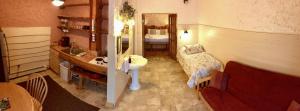 Postel nebo postele na pokoji v ubytování Homer Inn & Spa