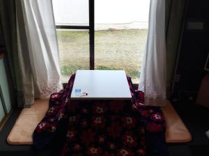 Fotografie z fotogalerie ubytování Guesthouse SHELL v destinaci Naošima