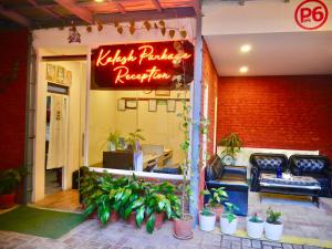 a restaurant with a sign on the front of it at Kalash Parkaze Glamping Hostel in Pokhara
