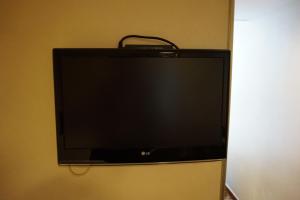 Televisor o centre d'entreteniment de Lander Hotel Prince Edward