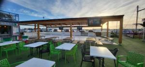 a group of tables and chairs on a patio at Cayton Bay Kestrel40 in Cayton