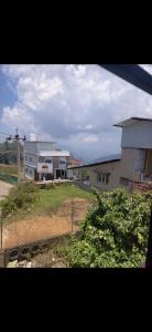 a view from a window of a building at NILORA stay KODAI in Kodaikānāl