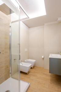 a bathroom with a toilet and a sink at Signa, Firenze Casa Pilade in Signa +27 photos