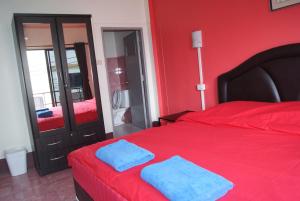 Postel nebo postele na pokoji v ubytování Pineapple Guesthouse