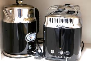 Kemudahan buat kopi dan teh di Gästehaus-Fulda